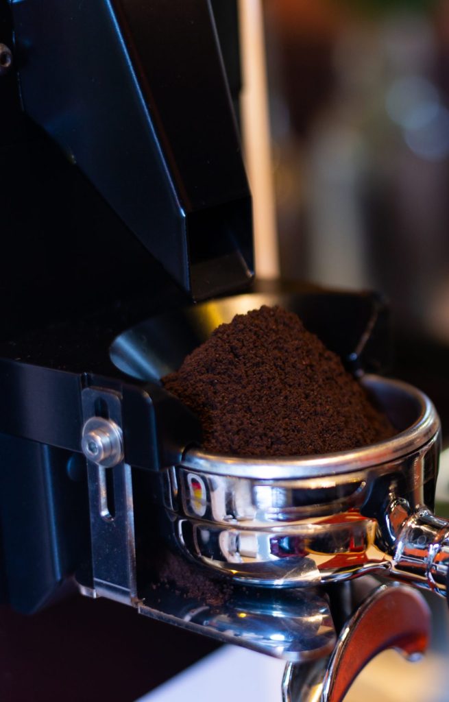 Coffe grinder in cafe.